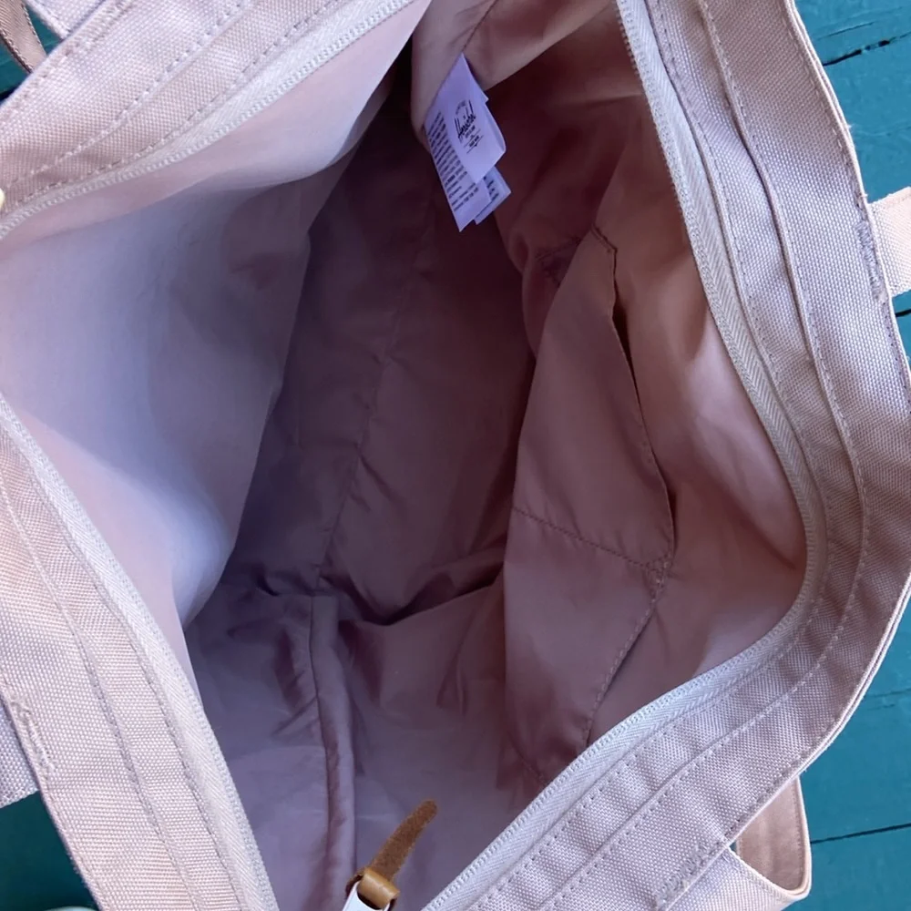 Herschel Supply Co. rose colored‎ canvas tote bag.